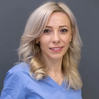 Dr Claudia Barbu - Chirurgie si Implantologie
